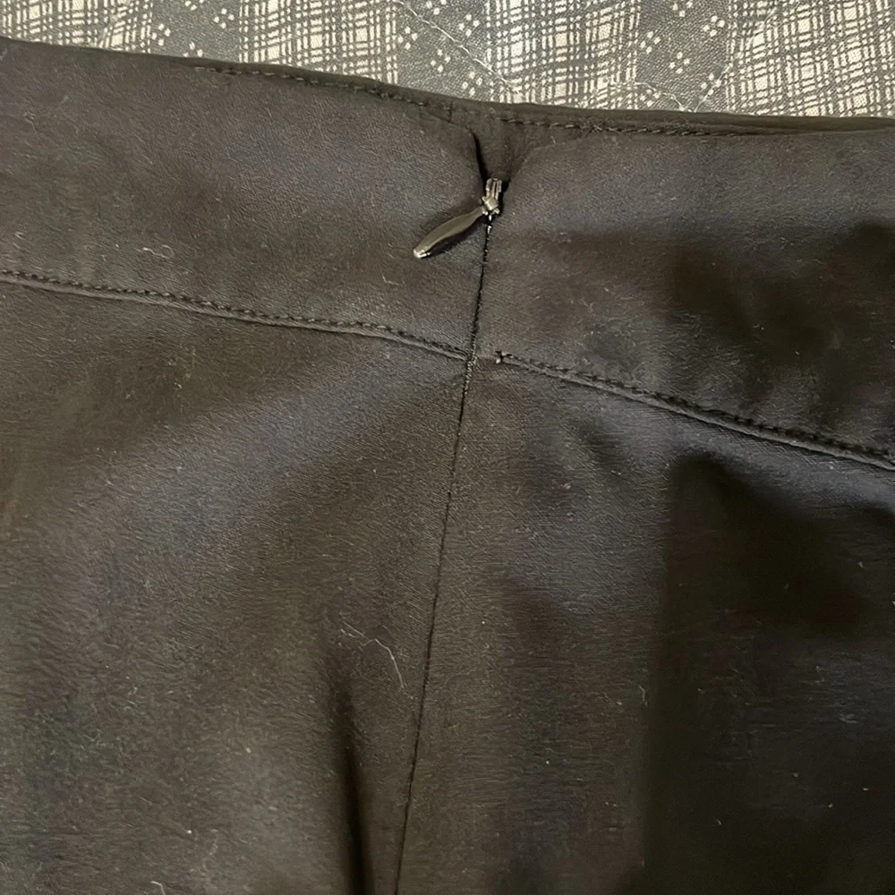 Women’s size 6, black pencil skirt stretchy. Lattice lace up. Hidden side zipper